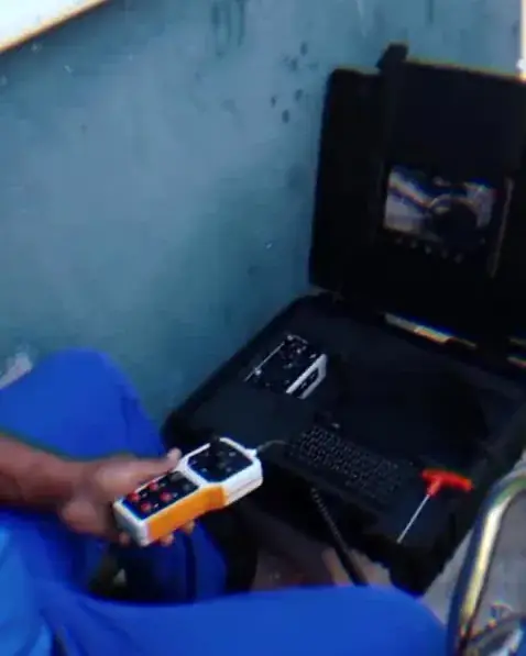 Plumber running a CCTV drain camera inspection at a Cape Town home